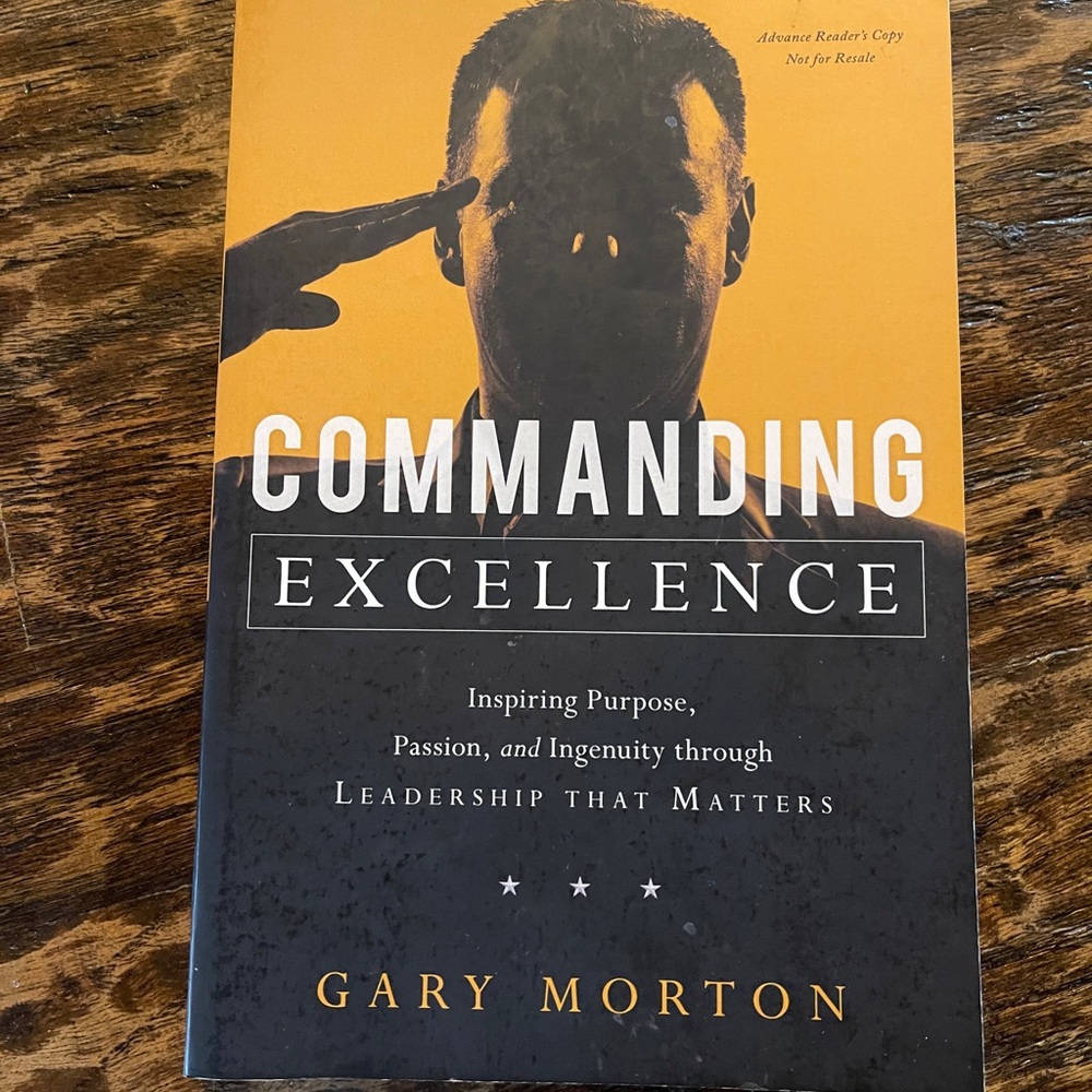 Commanding Excellence by Gary Morton - Black and Orange Cover